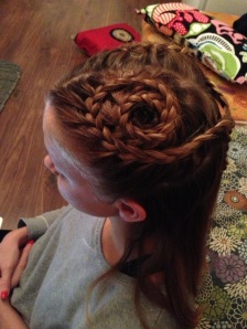 spiral braids tied together at the back