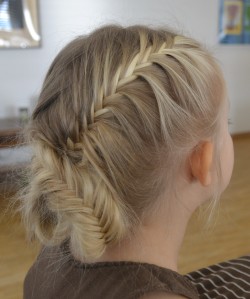 two french fishtail braids crossed over and pinned up