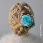 Waterfall into 4-strand pull up braids into frenchbraid and braided bun